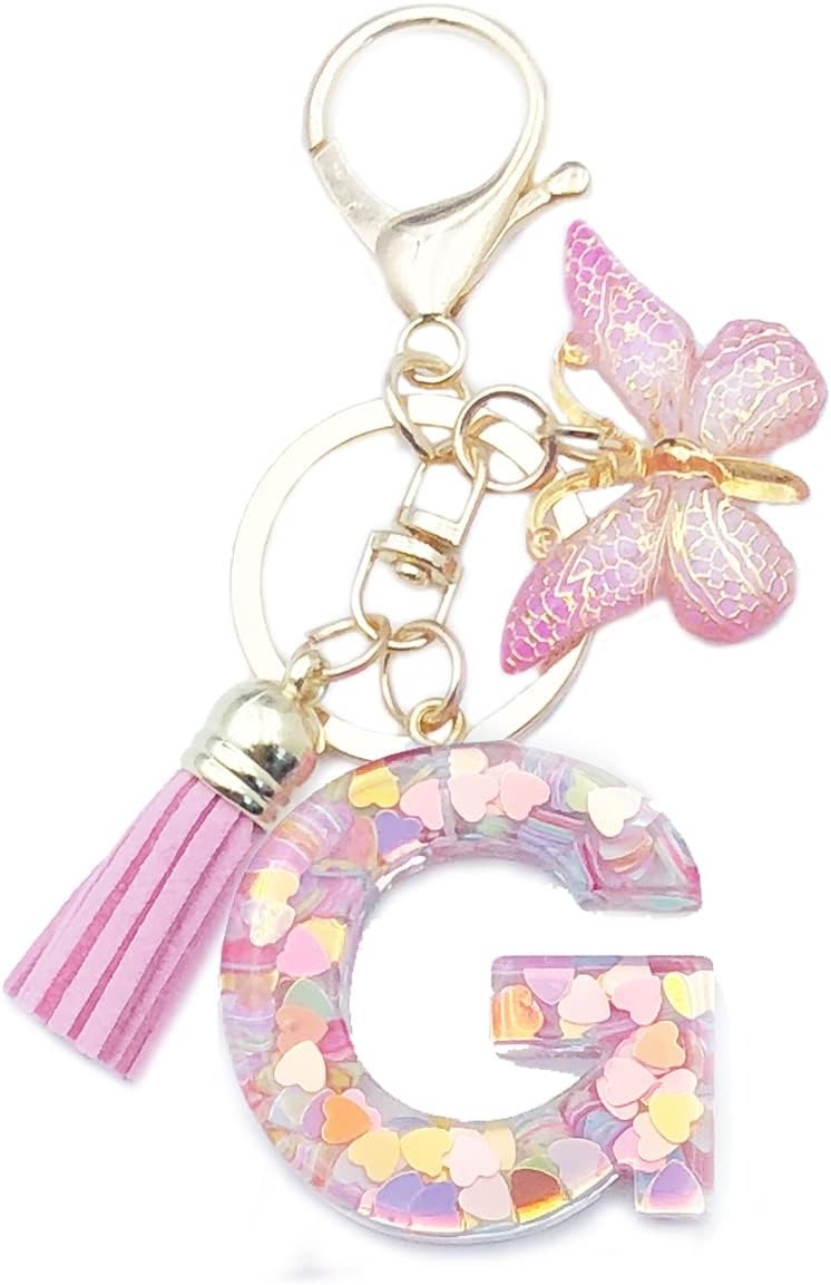 Keychain with letter 'G' and butterfly charm